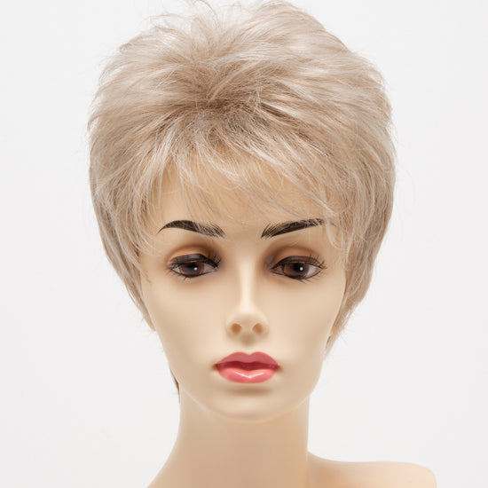 front side of a short Kinner Beauty Wigs wig for woman on mannequin head 