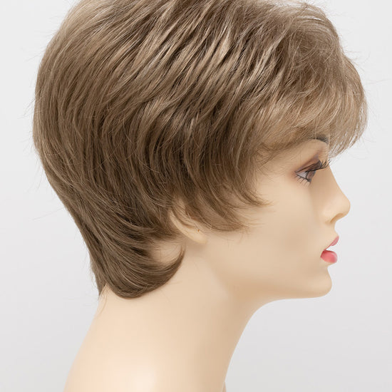 profile side of a short Kinner Beauty Wigs wig on woman head 