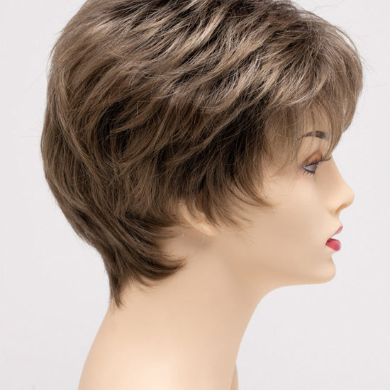 profile side of a short Kinner Beauty Wigs wig on woman head 