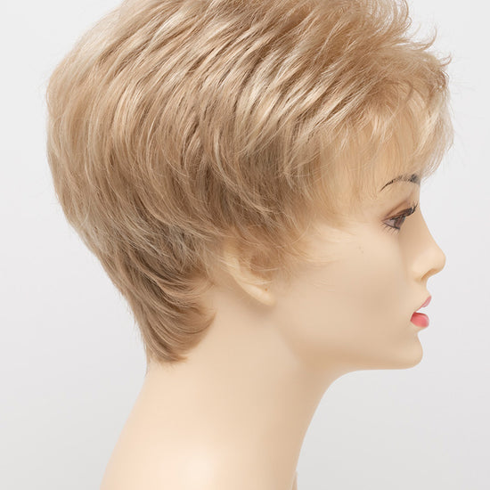 profile side of a short Kinner Beauty Wigs wig on woman head 