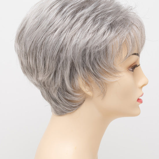 profile side of a short Kinner Beauty Wigs wig on woman head 