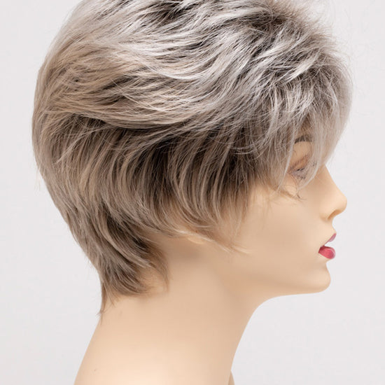 profile side of a short Kinner Beauty Wigs wig on woman head 