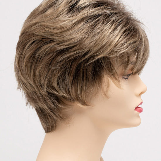 profile side of a short Kinner Beauty Wigs wig on woman head 