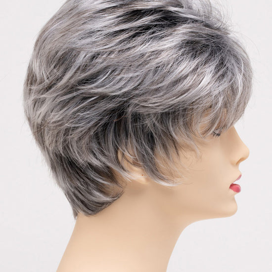 profile side of a short Kinner Beauty Wigs wig on woman head 