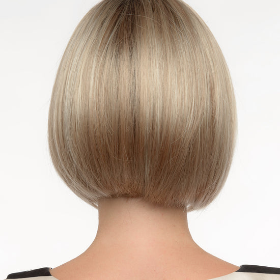 back side of a short wig Kinner Beauty Wigs for woman on mannequin head 