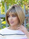 front side of a short Kinner Beauty Wigs wig on woman head 