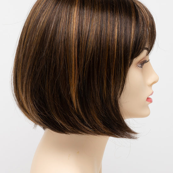 profile side of a short Kinner Beauty Wigs wig on woman head 