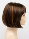 profile side of a short Kinner Beauty Wigs wig on woman head 