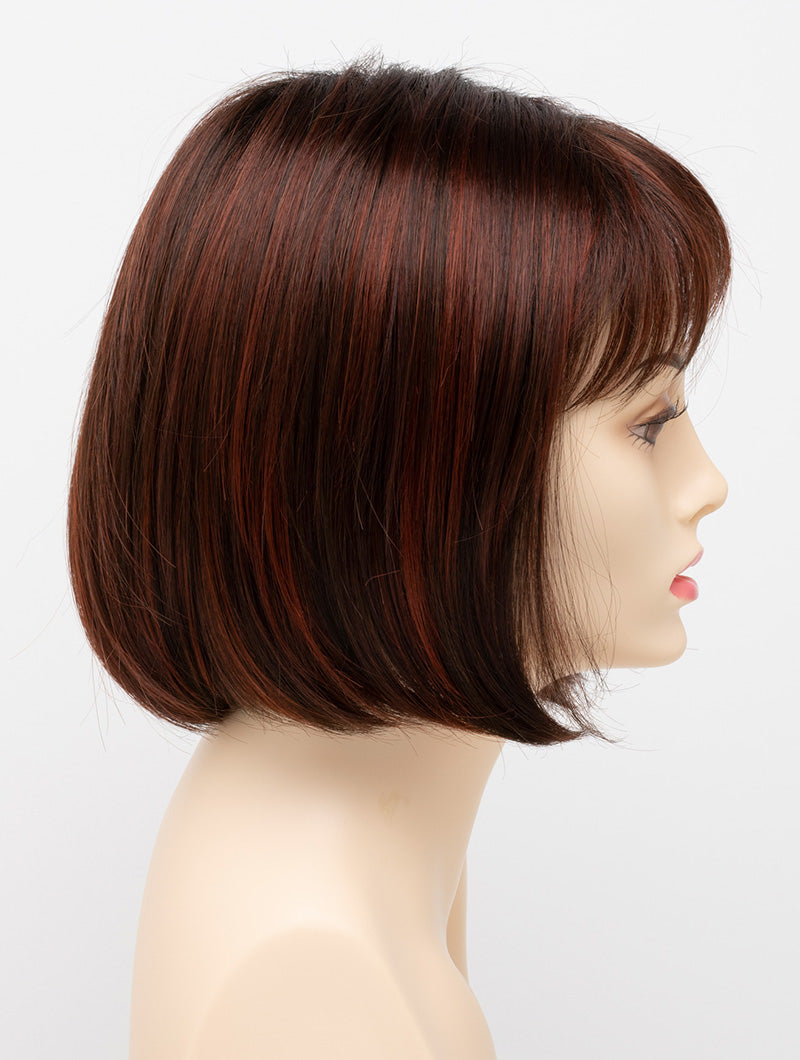 profile side of a short Kinner Beauty Wigs wig on woman head 