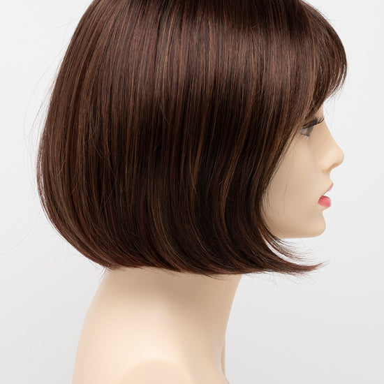 profile side of a short Kinner Beauty Wigs wig on woman head 