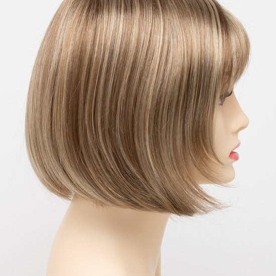 profile side of a short Kinner Beauty Wigs wig on woman head 