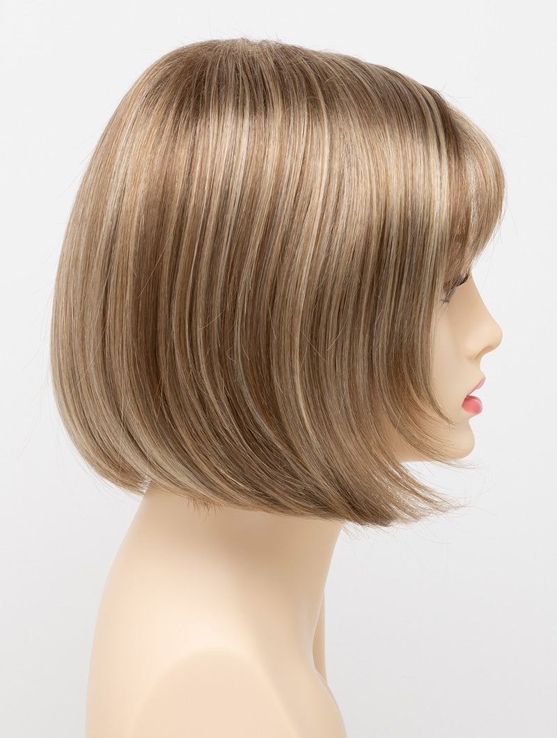 profile side of a short Kinner Beauty Wigs wig on woman head 