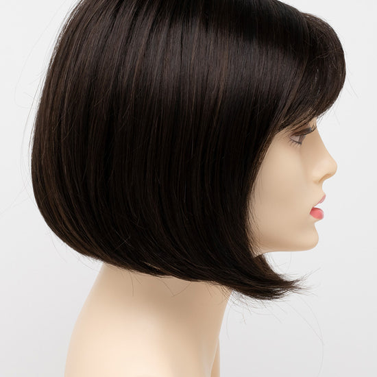 profile side of a short Kinner Beauty Wigs wig on woman head 