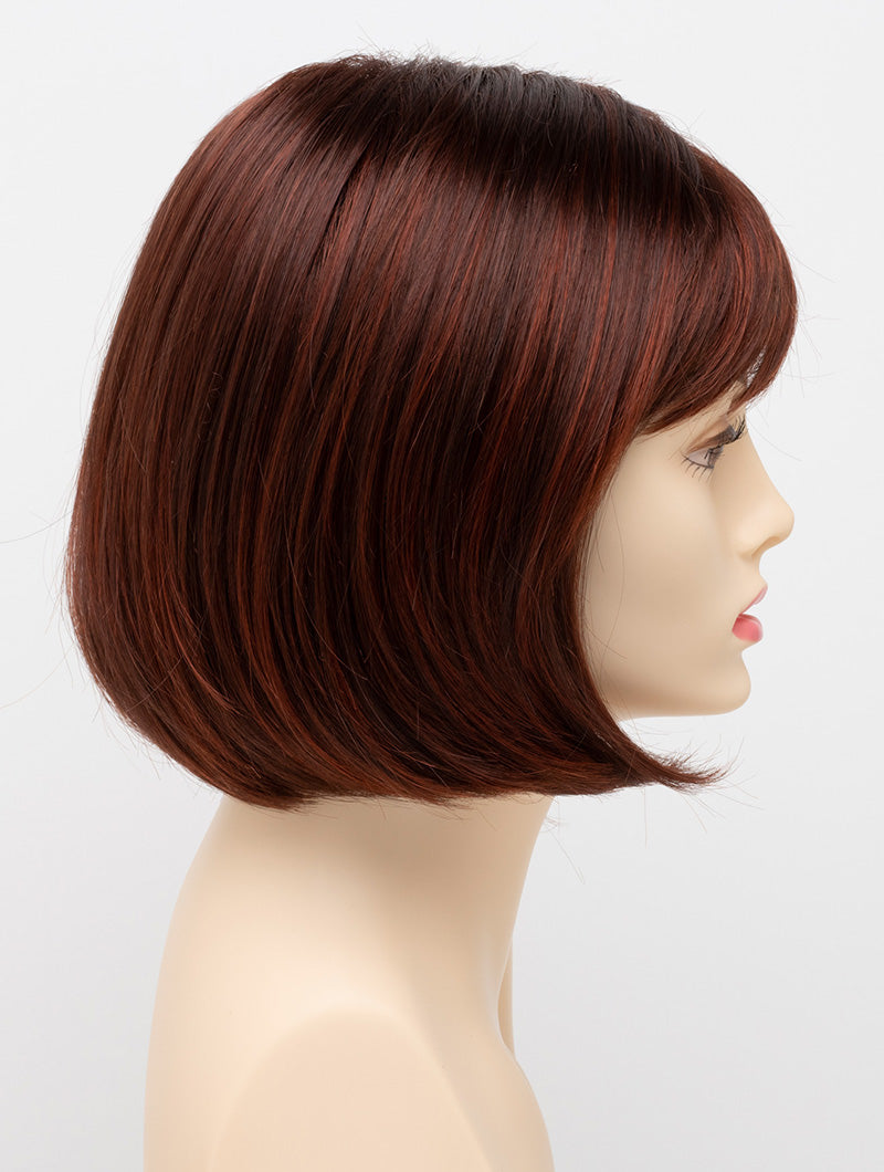 profile side of a short Kinner Beauty Wigs wig on woman head 