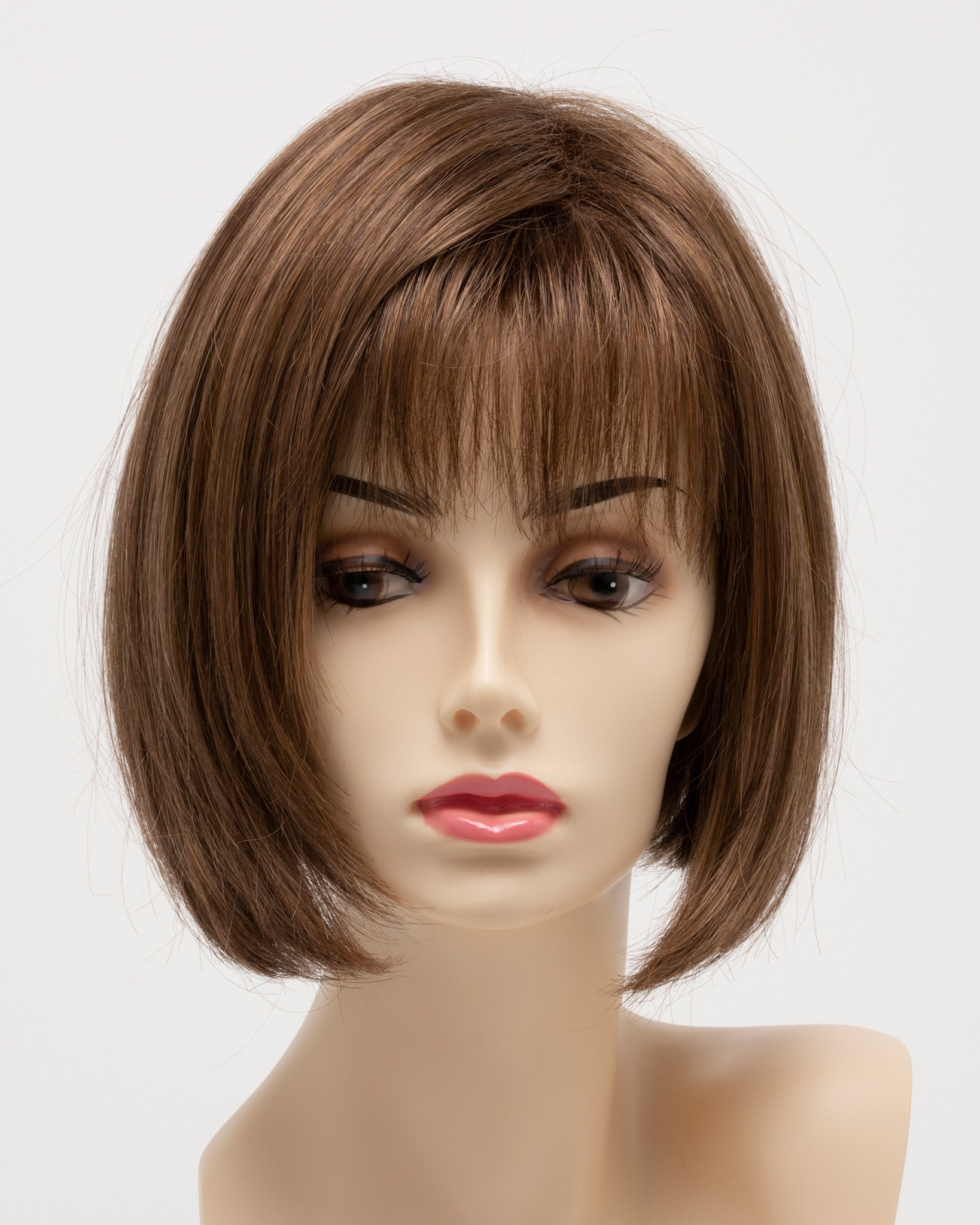 front side of a short Kinner Beauty Wigs wig for woman on mannequin head 