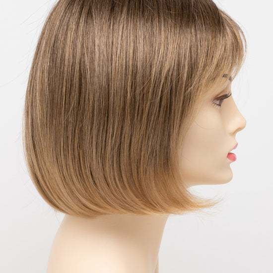 profile side of a short Kinner Beauty Wigs wig on woman head 