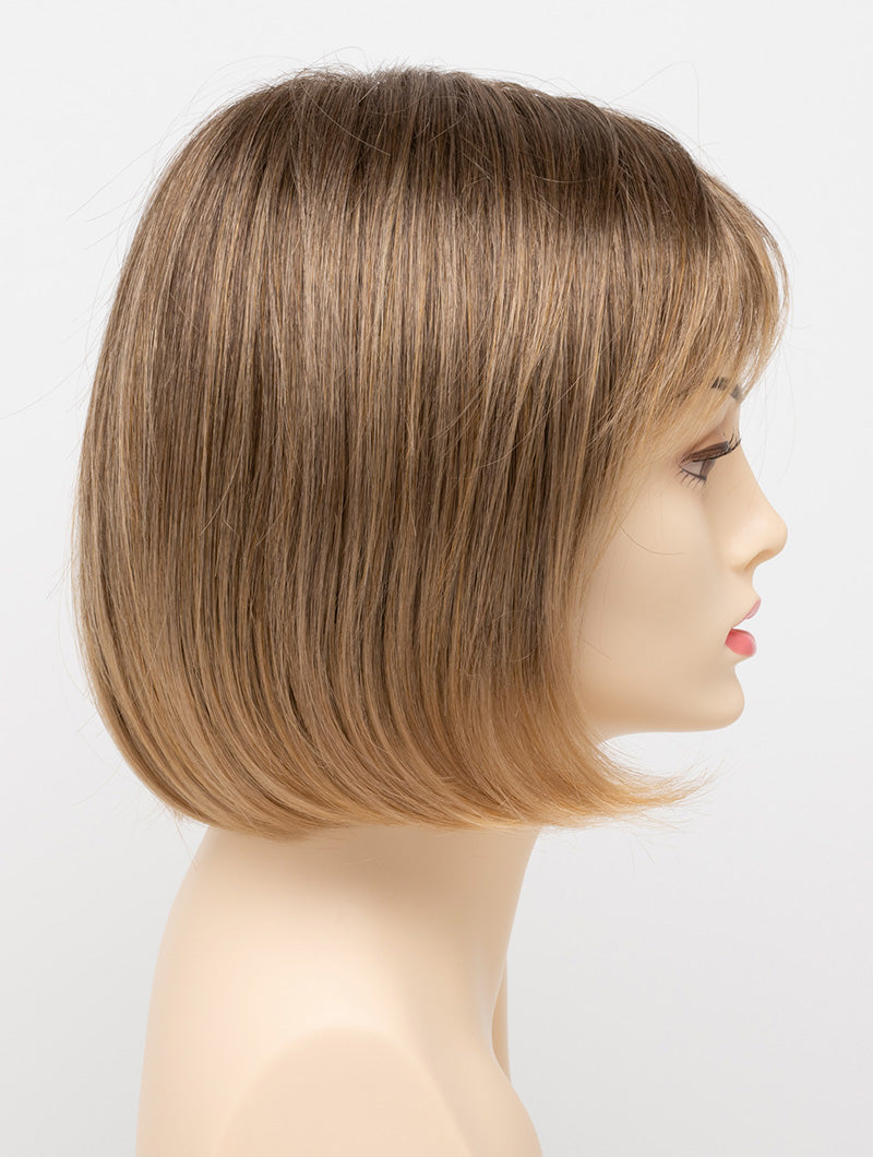 profile side of a short Kinner Beauty Wigs wig on woman head 