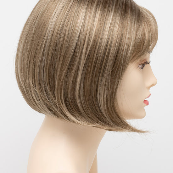 profile side of a short Kinner Beauty Wigs wig on woman head 