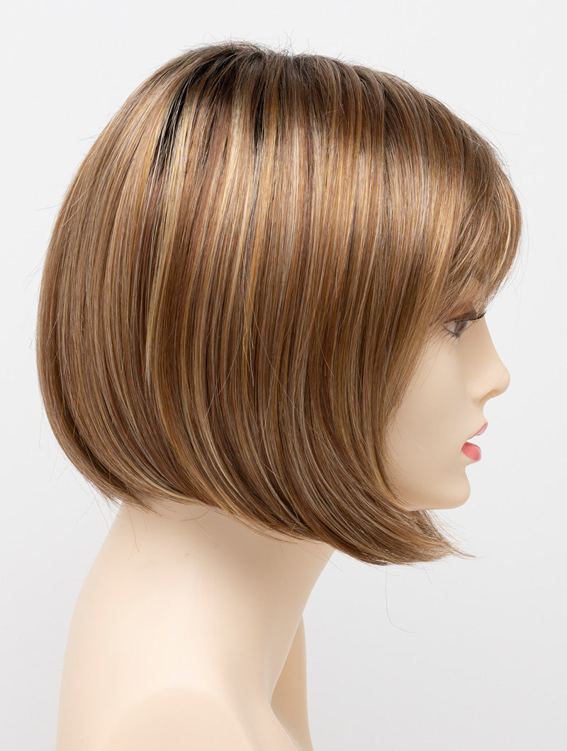 profile side of a short Kinner Beauty Wigs wig on woman head 