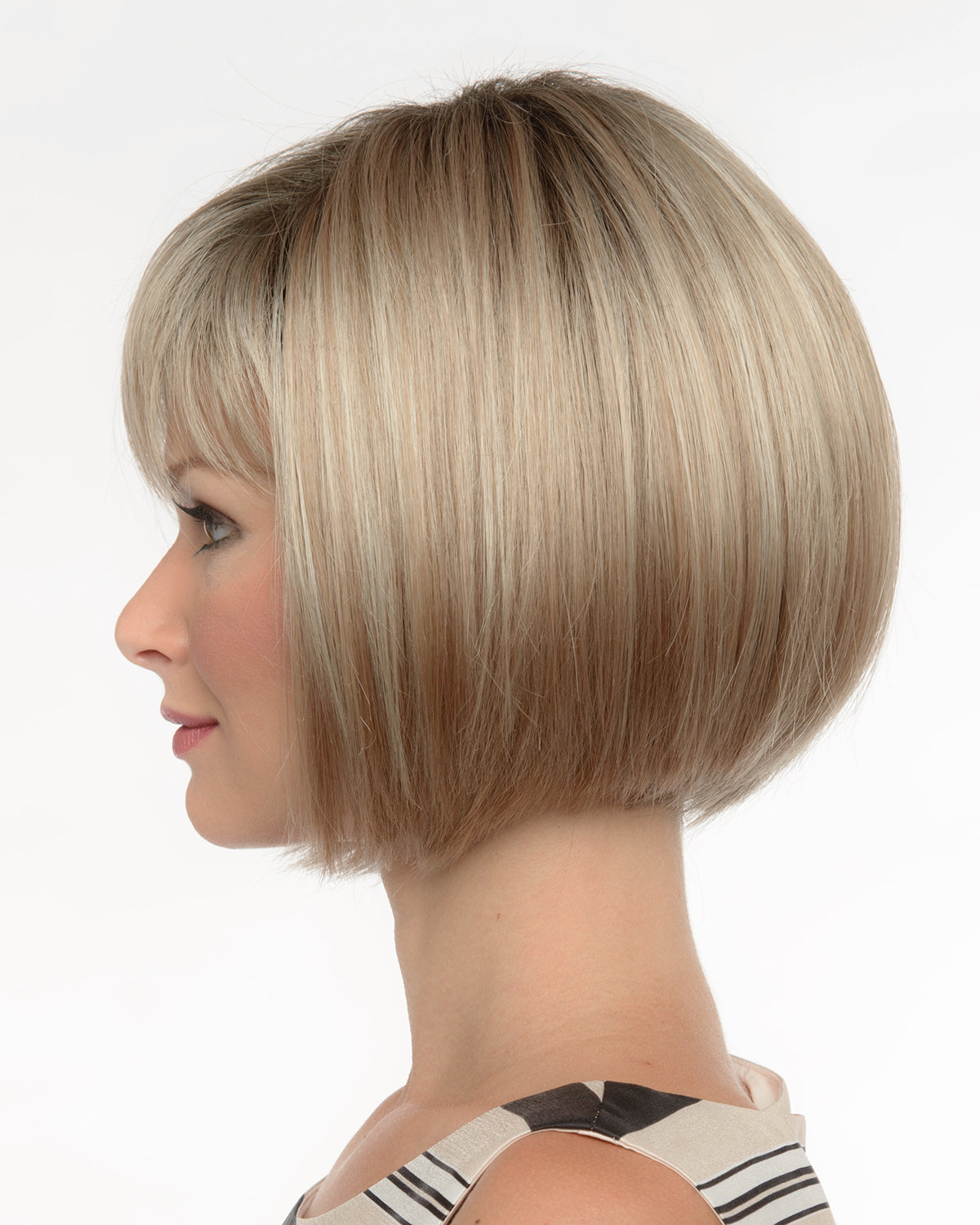 profile side of a short Kinner Beauty Wigs wig on woman head 