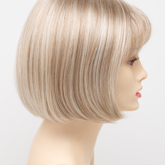 profile side of a short Kinner Beauty Wigs wig on woman head 