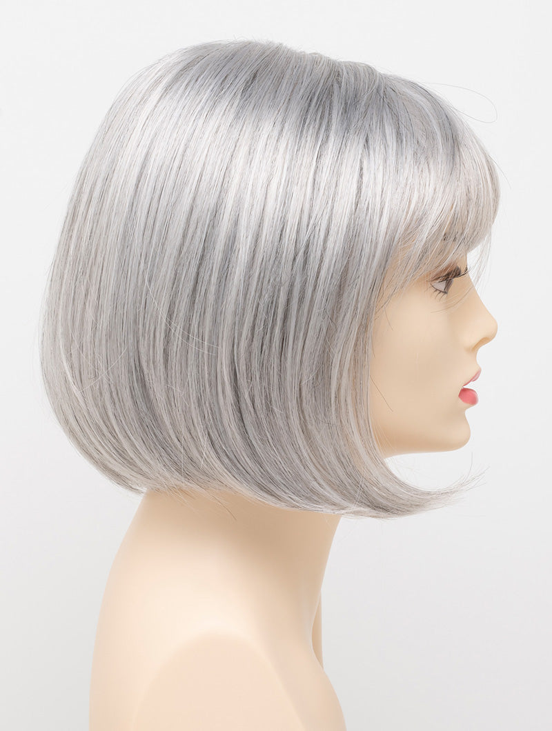 profile side of a short Kinner Beauty Wigs wig on woman head 