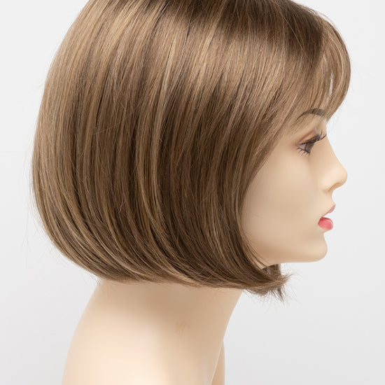 profile side of a short Kinner Beauty Wigs wig on woman head 