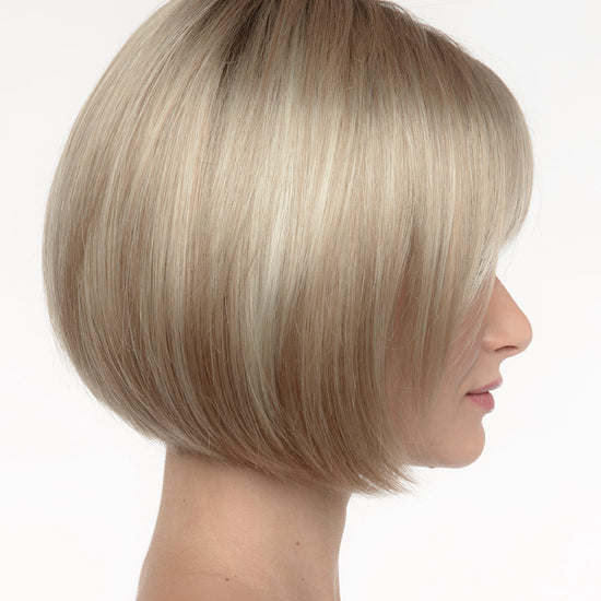 profile side of a short Kinner Beauty Wigs wig on woman head 