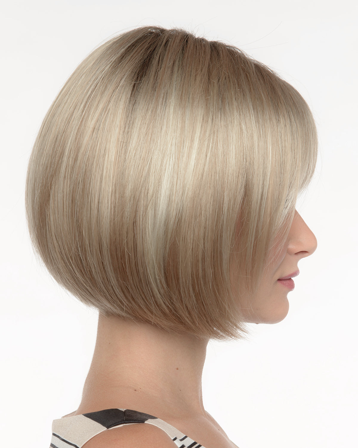 profile side of a short Kinner Beauty Wigs wig on woman head 