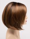 profile side of a short Kinner Beauty Wigs wig on woman head 