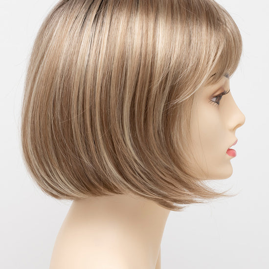 profile side of a short Kinner Beauty Wigs wig on woman head 