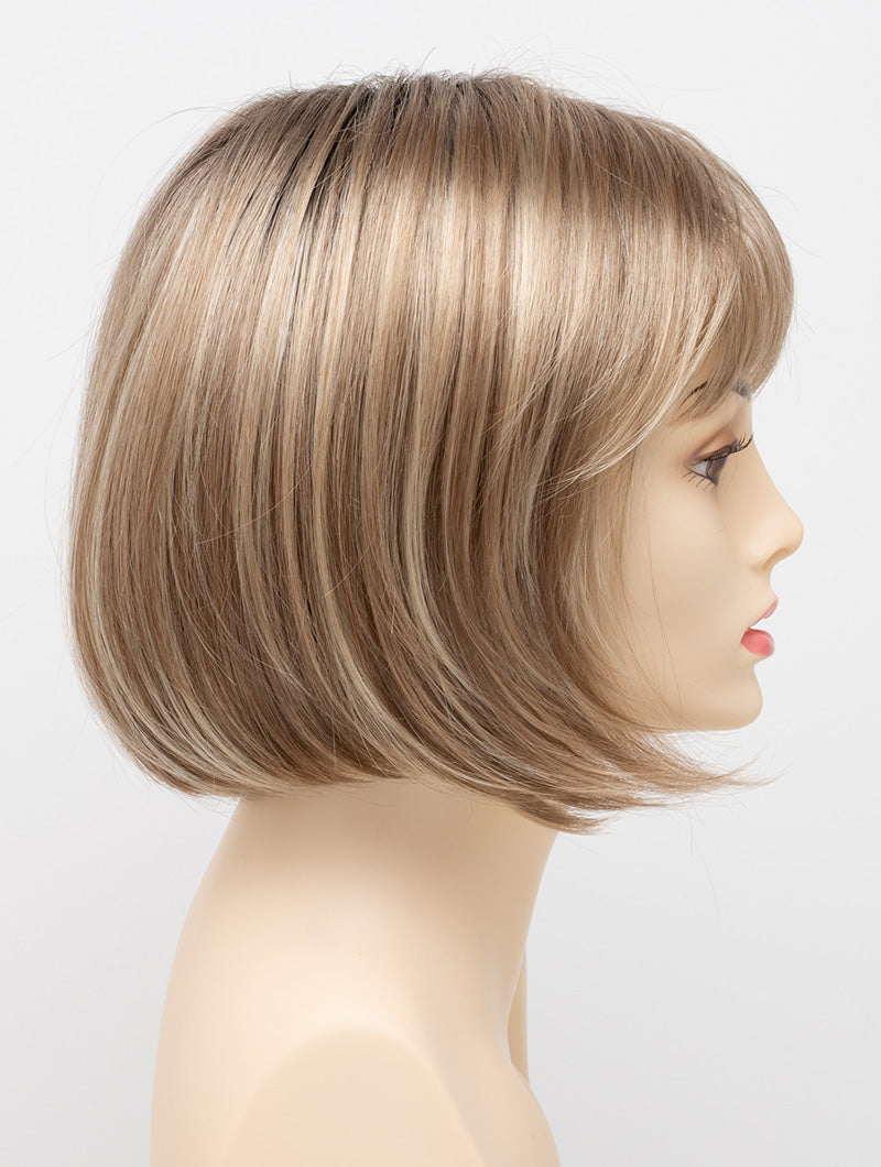 profile side of a short Kinner Beauty Wigs wig on woman head 