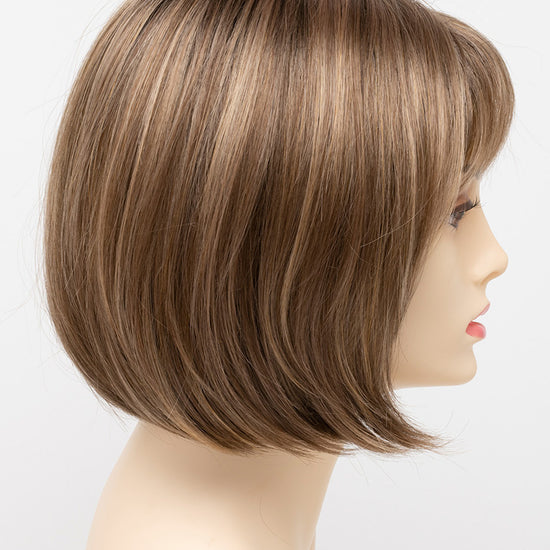 profile side of a short Kinner Beauty Wigs wig on woman head 