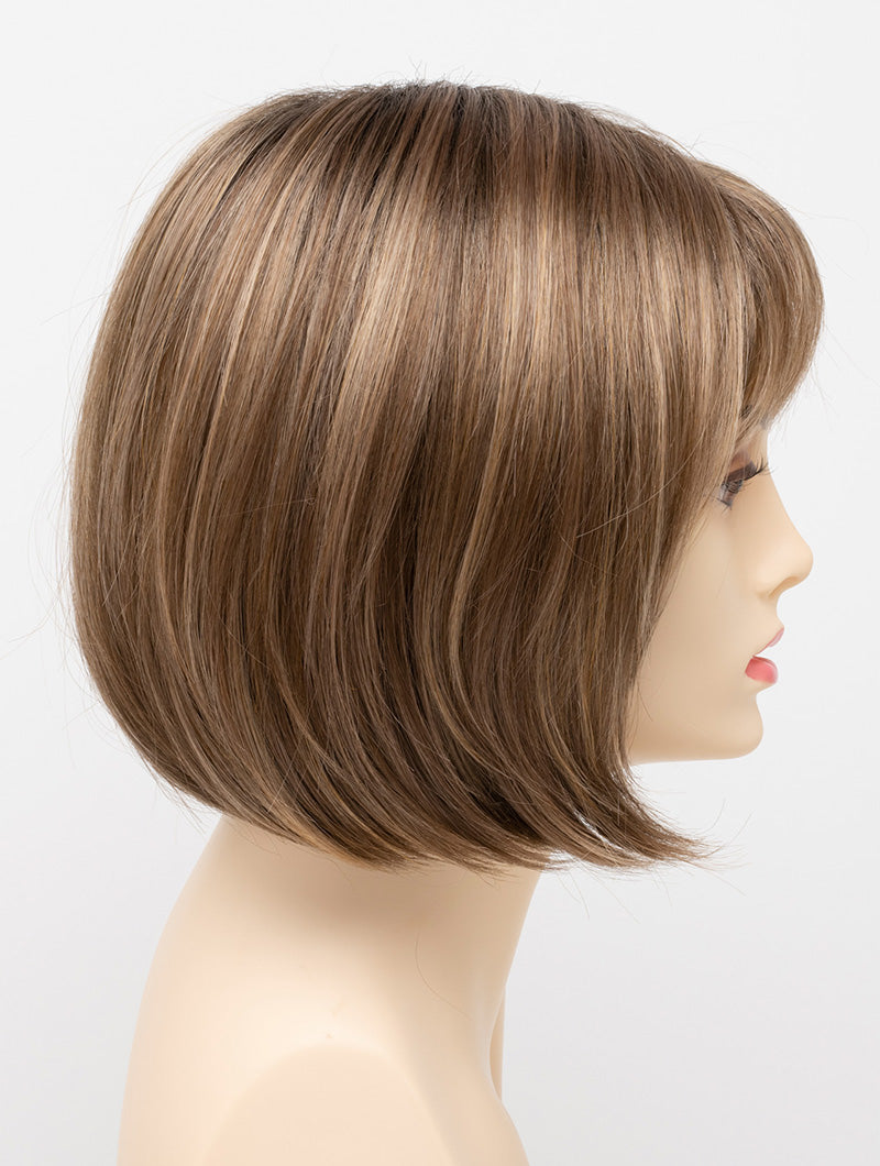 profile side of a short Kinner Beauty Wigs wig on woman head 