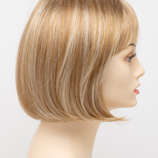 profile side of a short Kinner Beauty Wigs wig on woman head 