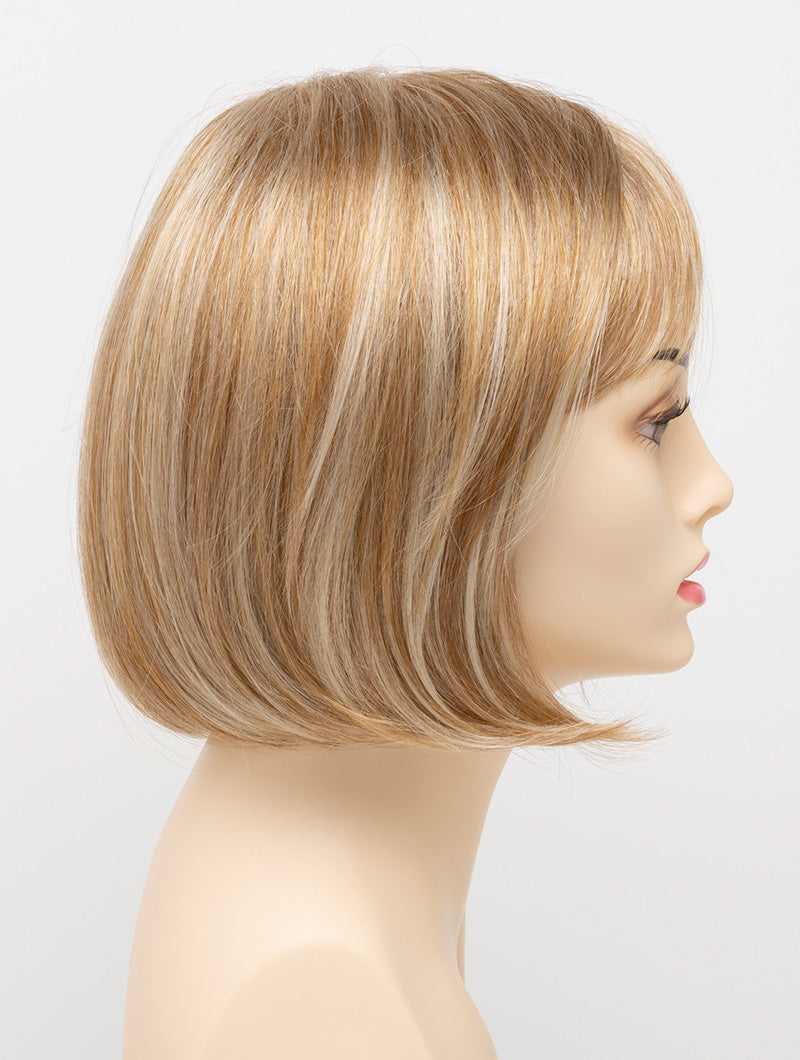 profile side of a short Kinner Beauty Wigs wig on woman head 