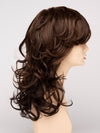 profile side of a long Kinner Beauty Wigs wig for woman on mannequin head 