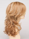 profile side of a long Kinner Beauty Wigs wig for woman on mannequin head 