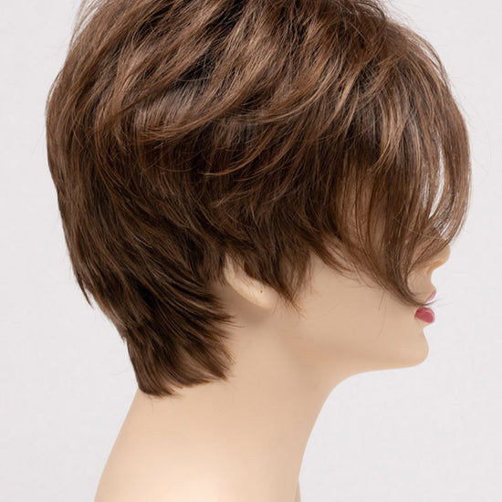 profile side of a short Kinner Beauty Wigs wig on woman head 