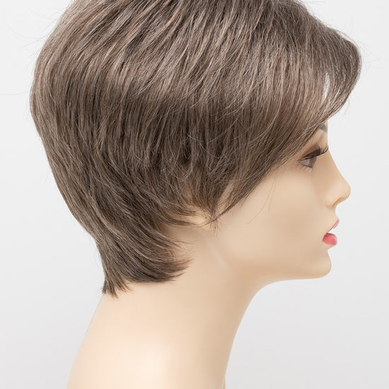 profile side of a short Kinner Beauty Wigs wig on woman head 