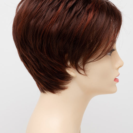 profile side of a short Kinner Beauty Wigs wig on woman head 