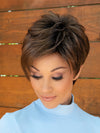 front side of a short Kinner Beauty Wigs wig on woman head 