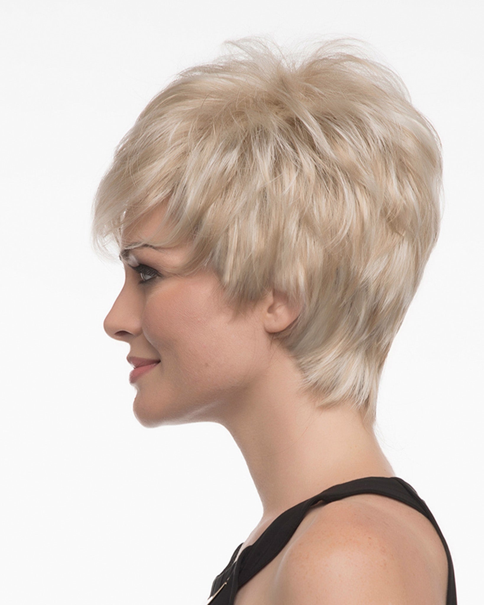 profile side of a short Kinner Beauty Wigs wig on woman head 