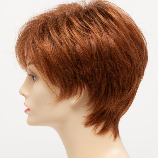 profile side of a short Kinner Beauty Wigs wig on woman head 