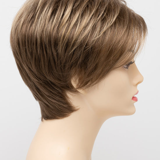 profile side of a short Kinner Beauty Wigs wig on woman head 