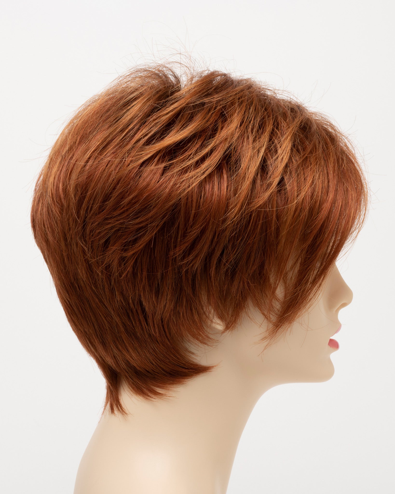 profile side of a short Kinner Beauty Wigs wig on woman head 