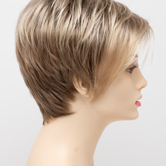 profile side of a short Kinner Beauty Wigs wig on woman head 