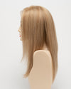 profile side of a long Kinner Beauty Wigs wig for woman on mannequin head 