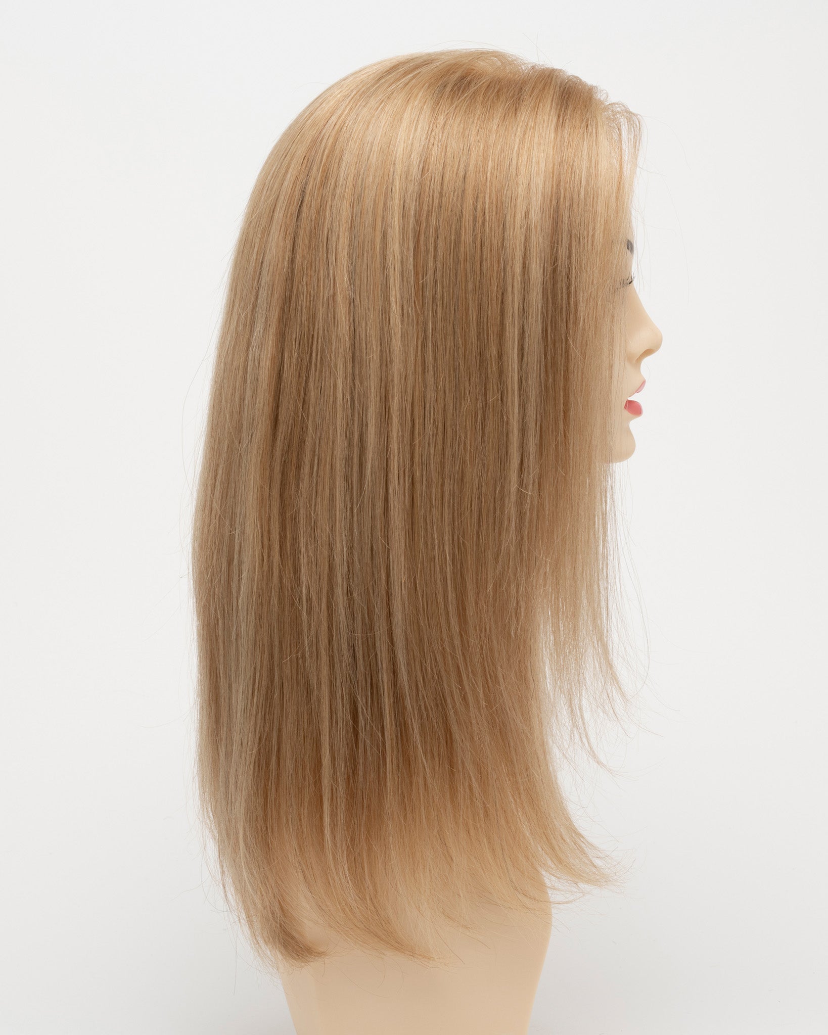 profile side of a long Kinner Beauty Wigs wig for woman on mannequin head 