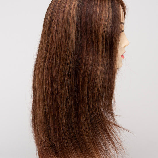 profile side of a long Kinner Beauty Wigs wig for woman on mannequin head 